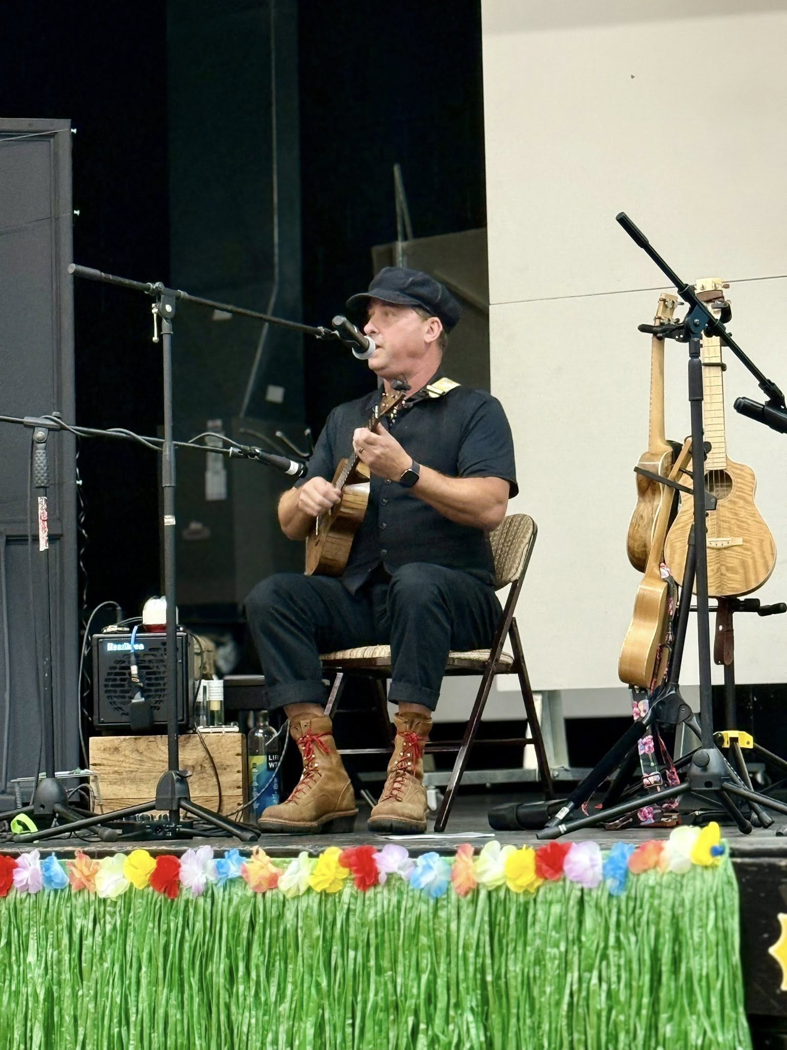 photo of strum brothers performing on ukuleles and singing